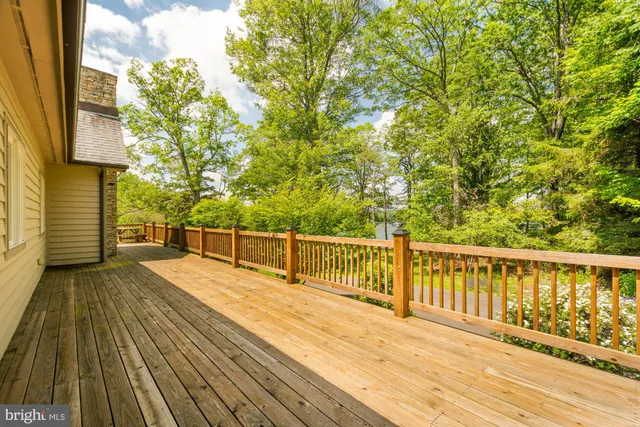 a view of lake with a yard