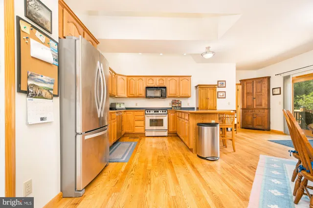 a bathroom with a toilet and shower