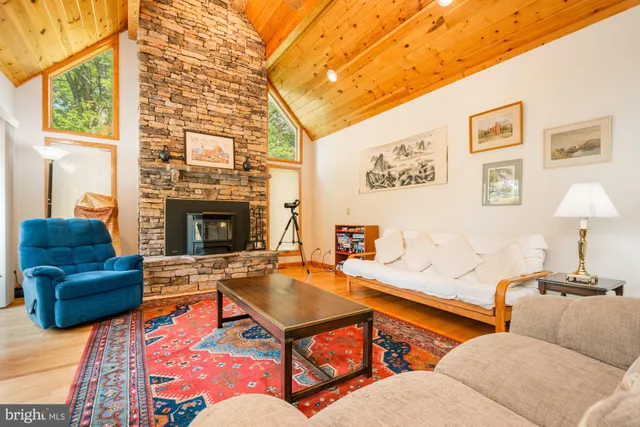 a bathroom with a sink mirror and toilet