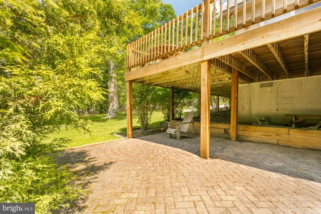 a view of a balcony with chairs