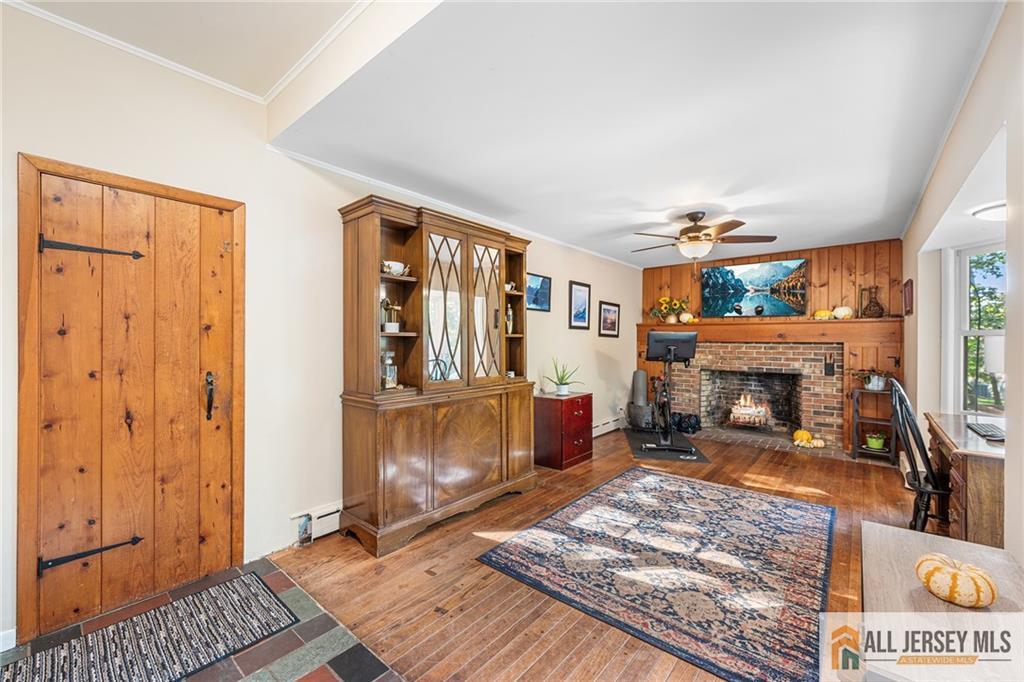 1266 Mt Vernon Road Bridgewater, NJ 08807 - Photo 16 of 44 a living room with furniture and a fireplace