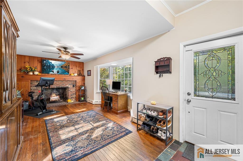 1266 Mt Vernon Road Bridgewater, NJ 08807 - Photo 18 of 44 a living room with furniture and a fireplace