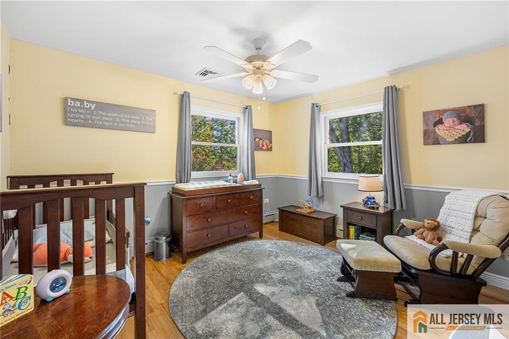 1266 Mt Vernon Road Bridgewater, NJ 08807 - Photo 19 of 44 a living room with furniture and a large window