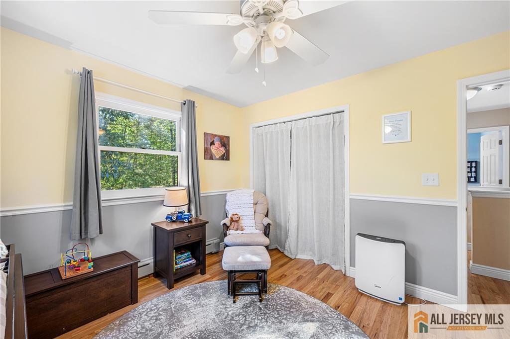 1266 Mt Vernon Road Bridgewater, NJ 08807 - Photo 21 of 44 a living room with furniture and a window
