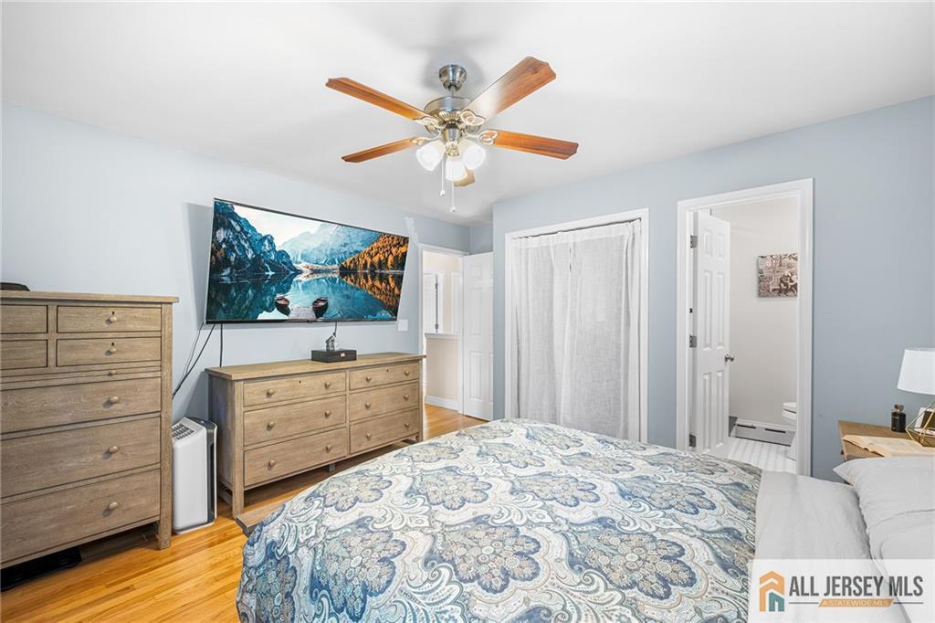 1266 Mt Vernon Road Bridgewater, NJ 08807 - Photo 23 of 44 a bedroom with a bed and a dresser