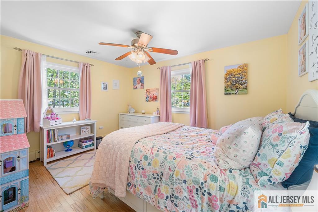 1266 Mt Vernon Road Bridgewater, NJ 08807 - Photo 28 of 44 a bedroom with a bed and a window