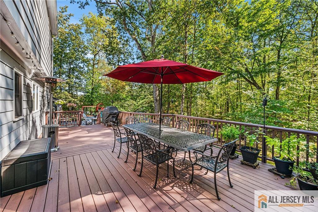 1266 Mt Vernon Road Bridgewater, NJ 08807 - Photo 36 of 44 a view of balcony with outdoor seating and wooden floor
