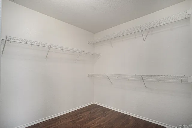 a view of a room with racks on the wall