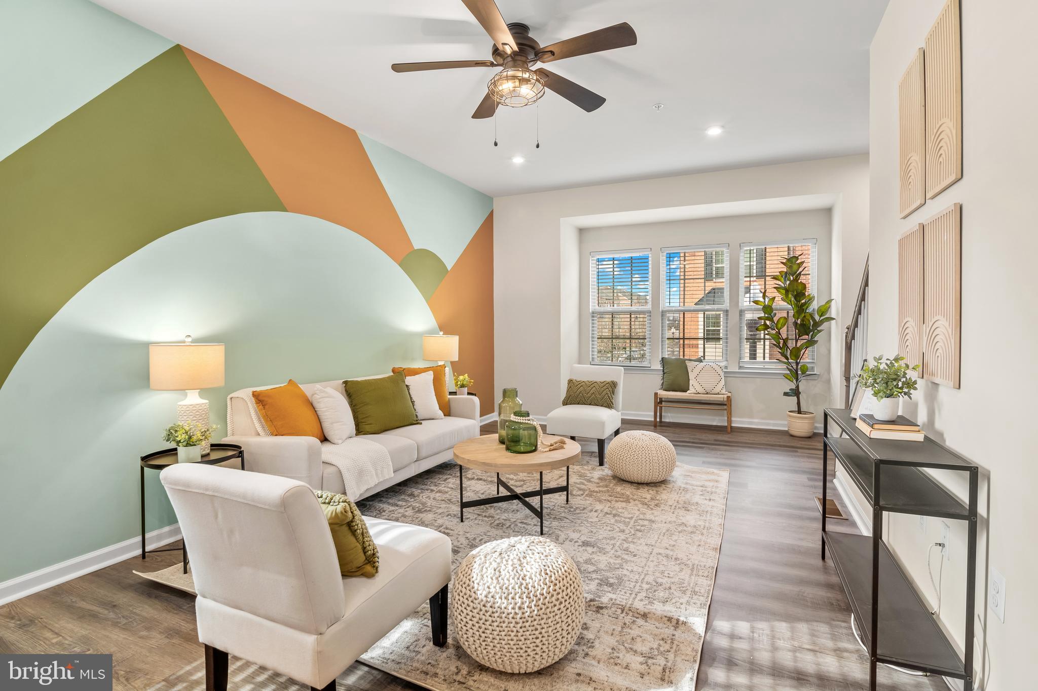 4701 Marlene Mews Baltimore, MD 21224 - Photo 13 of 39 a living room with furniture and a large window
