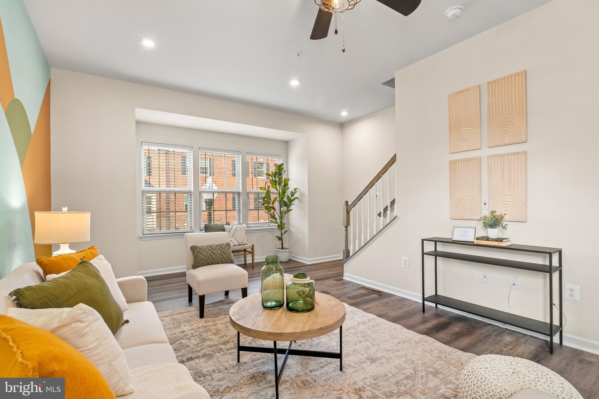 4701 Marlene Mews Baltimore, MD 21224 - Photo 14 of 39 a living room with furniture and a potted plant