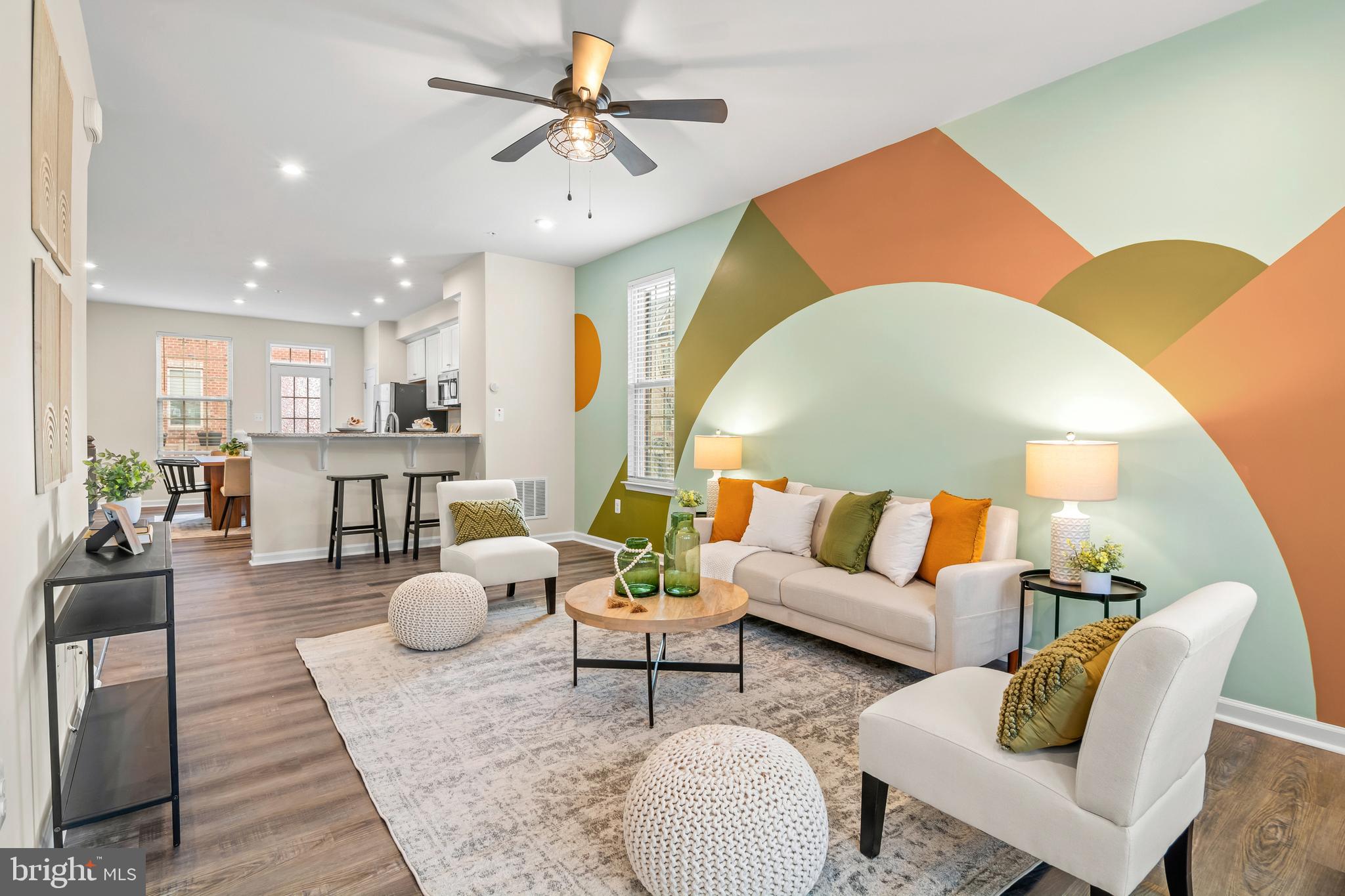 4701 Marlene Mews Baltimore, MD 21224 - Photo 15 of 39 a living room with furniture and a wooden floor