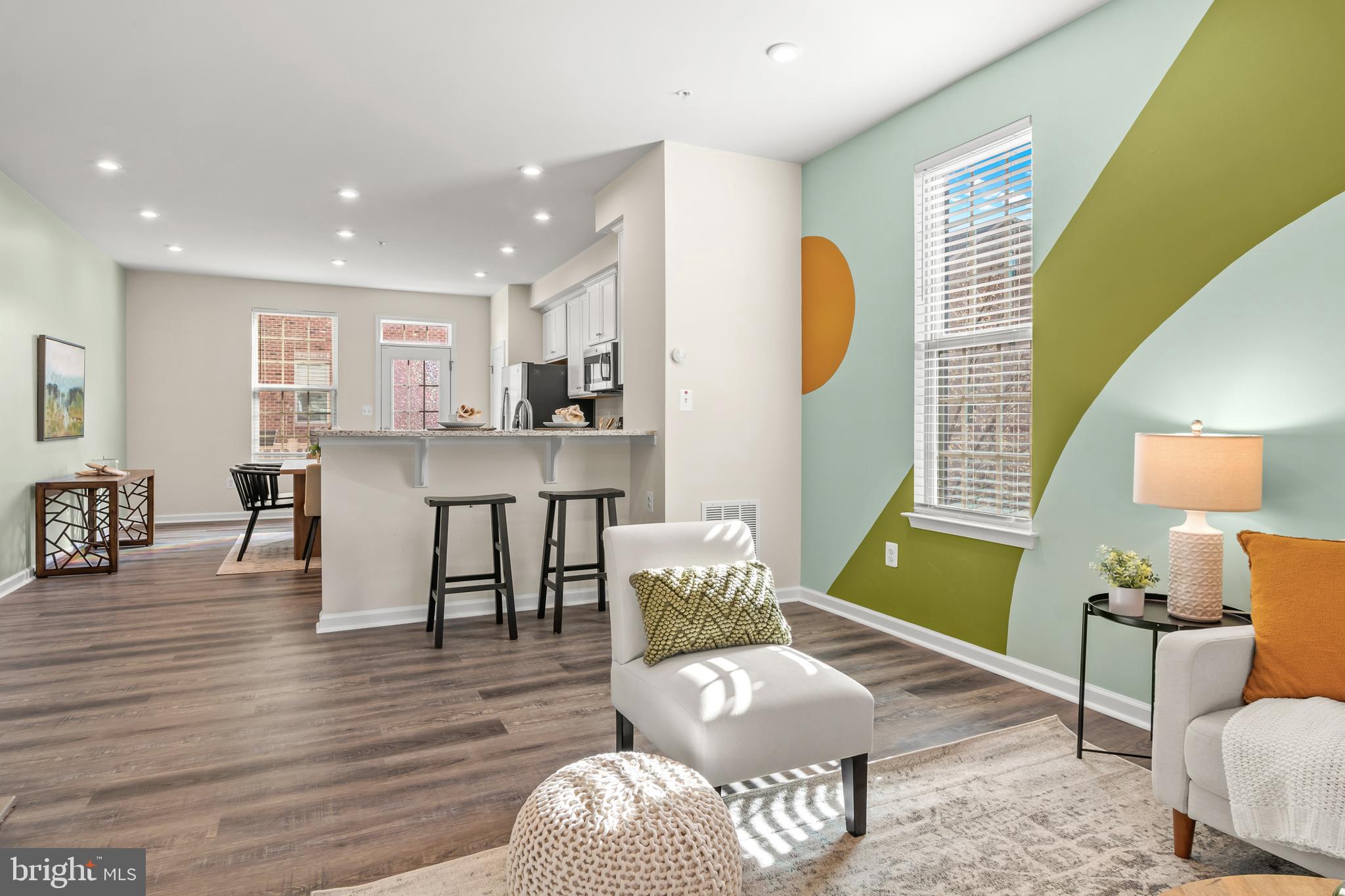 4701 Marlene Mews Baltimore, MD 21224 - Photo 16 of 39 a living room with furniture and a wooden floor