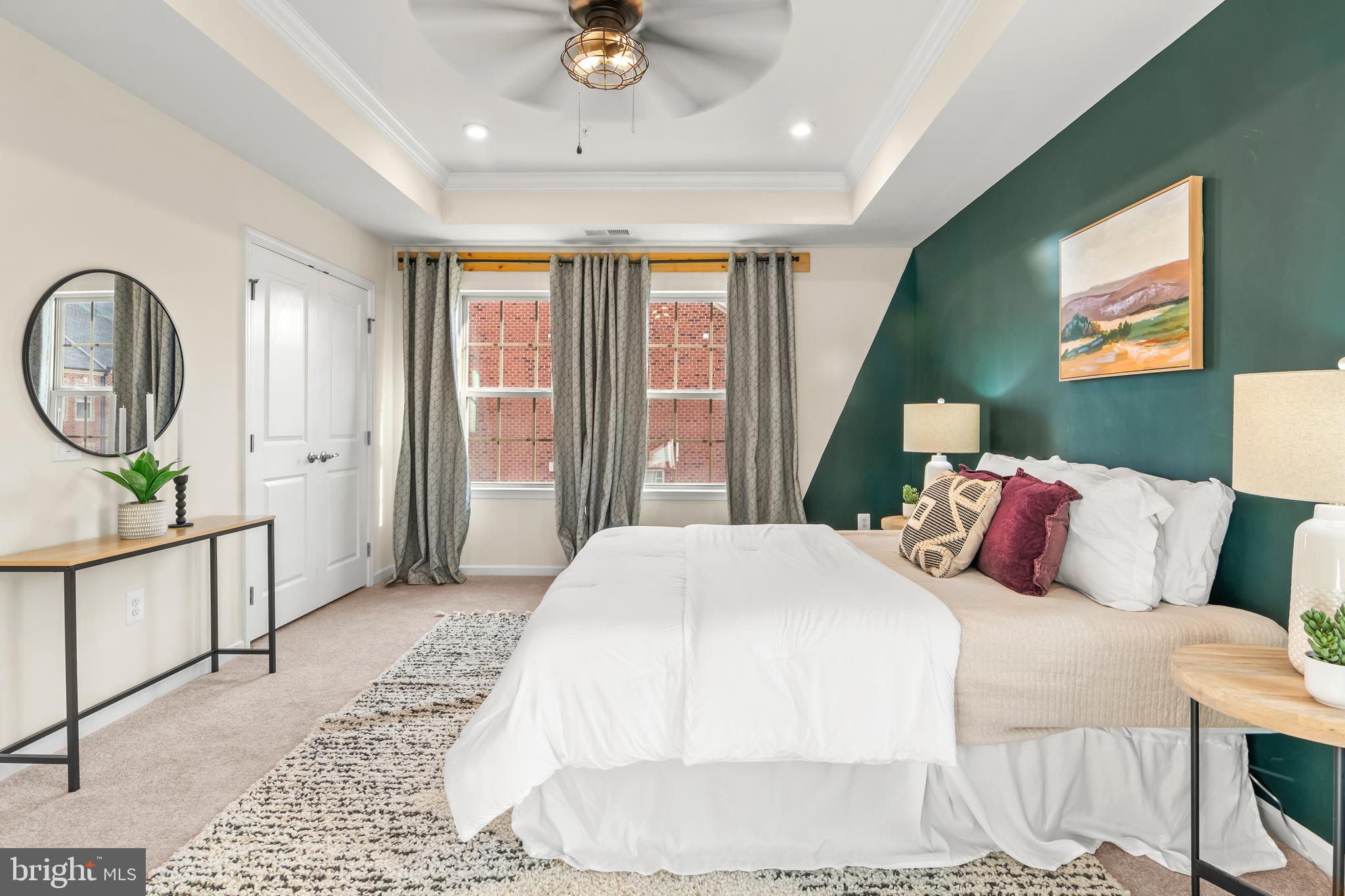 4701 Marlene Mews Baltimore, MD 21224 - Photo 19 of 39 a bedroom with a bed mirror and a window