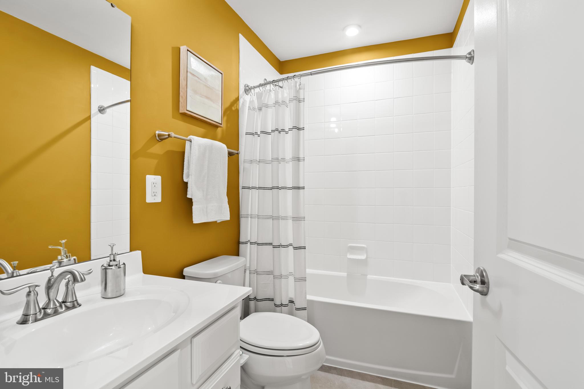 4701 Marlene Mews Baltimore, MD 21224 - Photo 25 of 39 a bathroom with a sink and a mirror