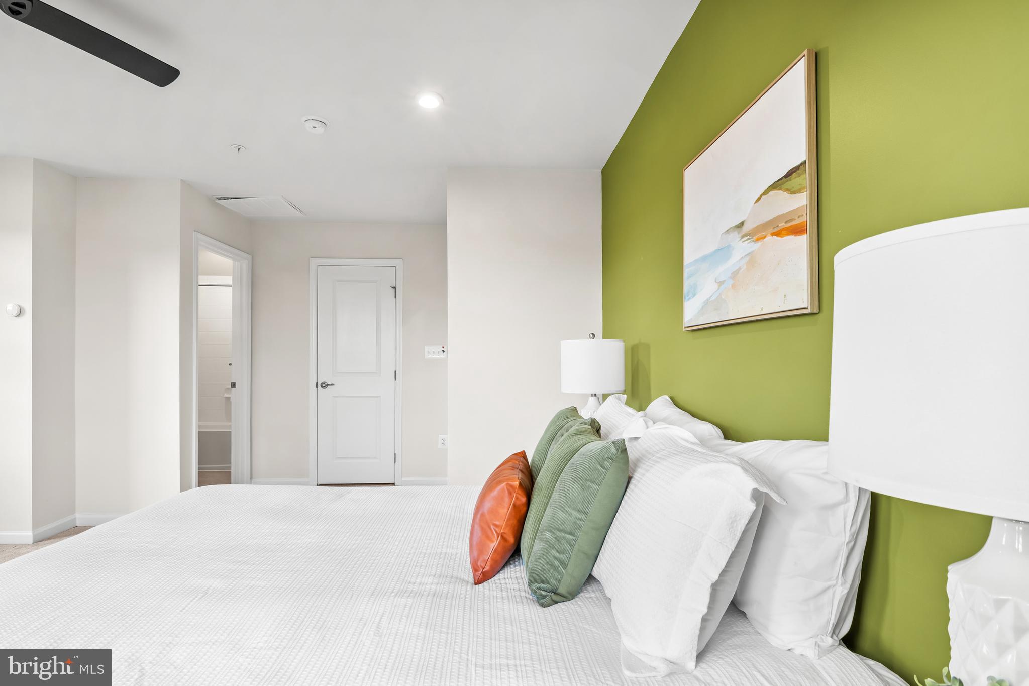 4701 Marlene Mews Baltimore, MD 21224 - Photo 30 of 39 a bedroom with a bed and a painting