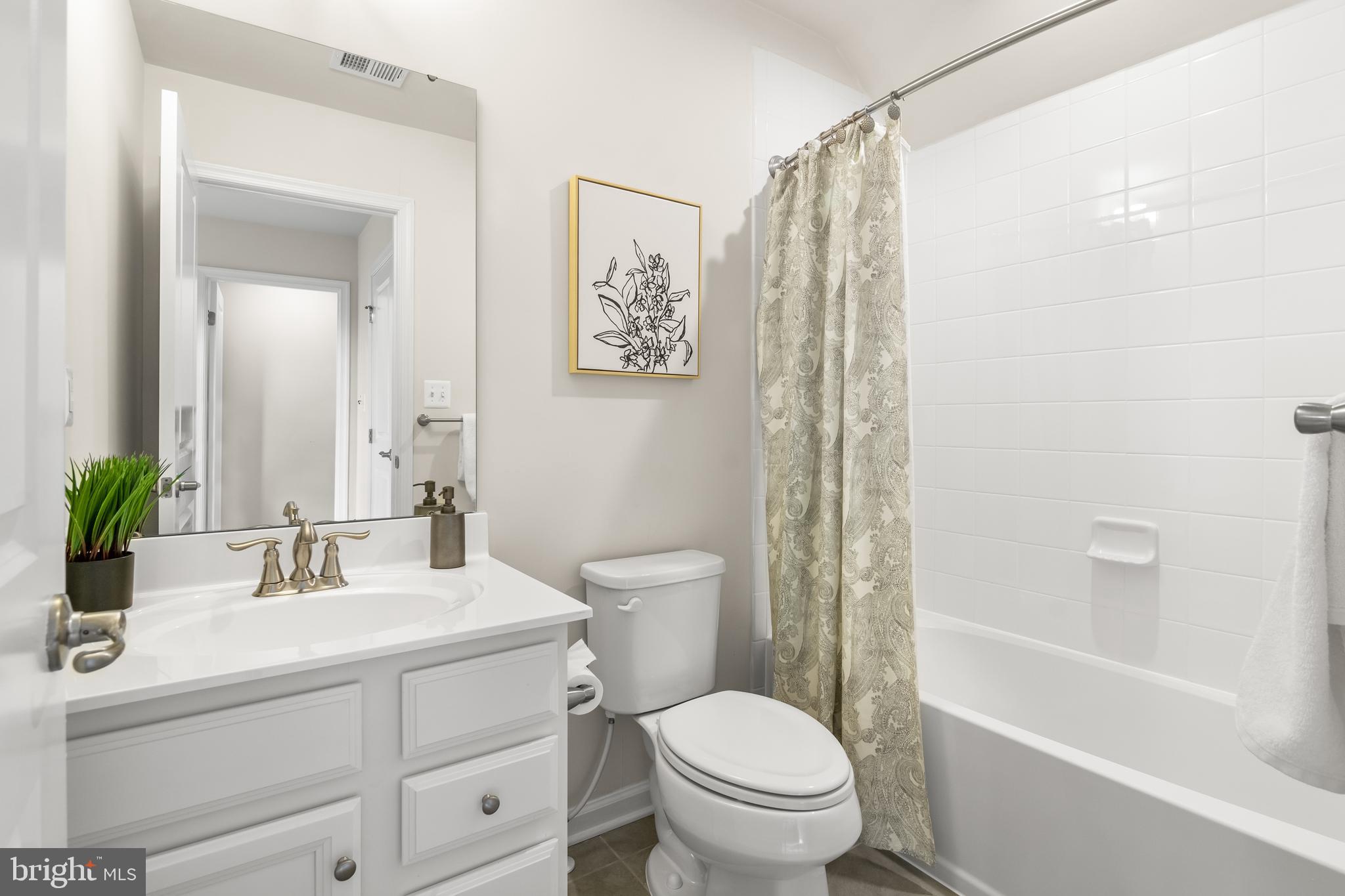 4701 Marlene Mews Baltimore, MD 21224 - Photo 31 of 39 a bathroom with a sink toilet and shower