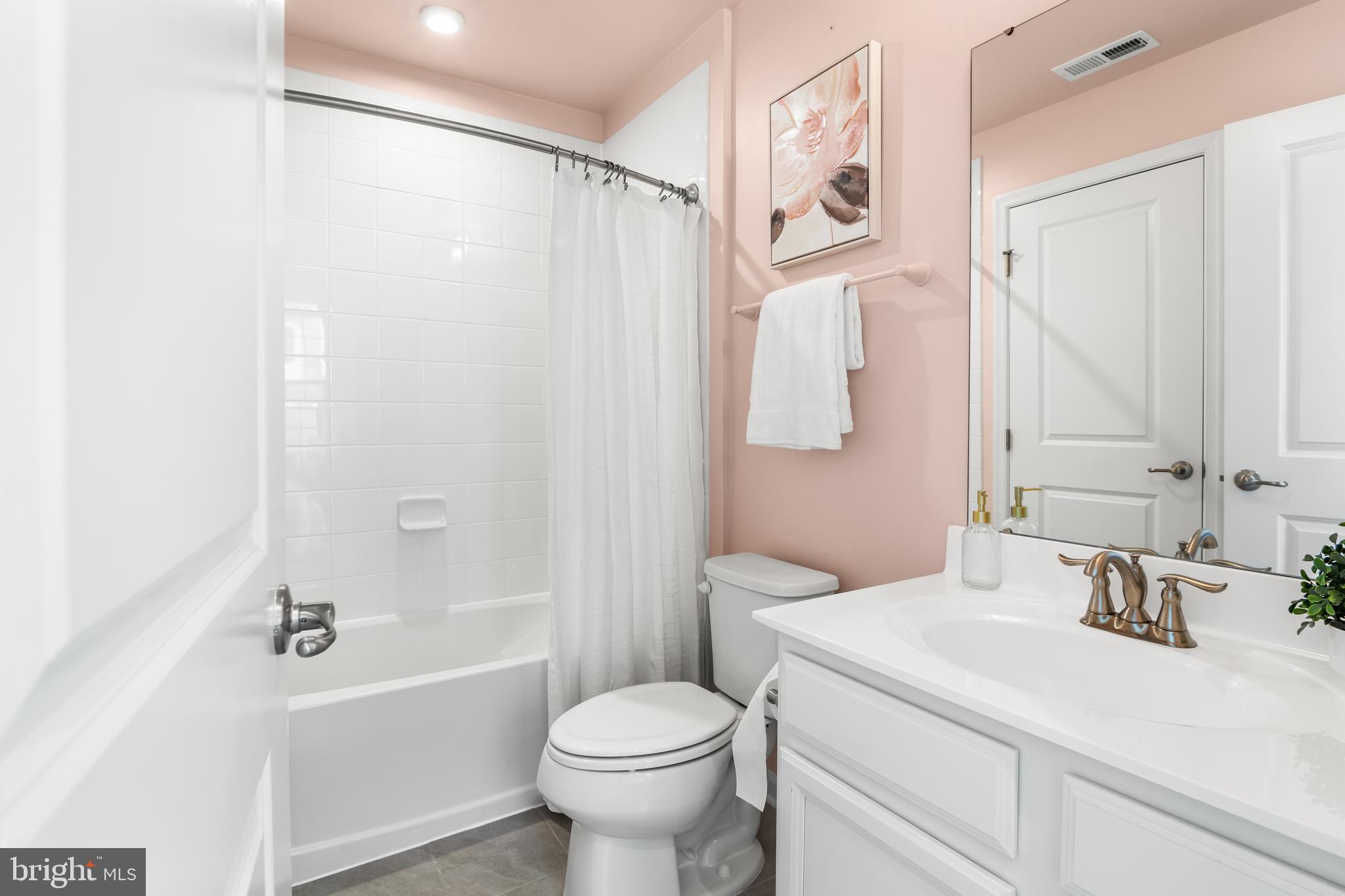 4701 Marlene Mews Baltimore, MD 21224 - Photo 33 of 39 a bathroom with a sink toilet and shower