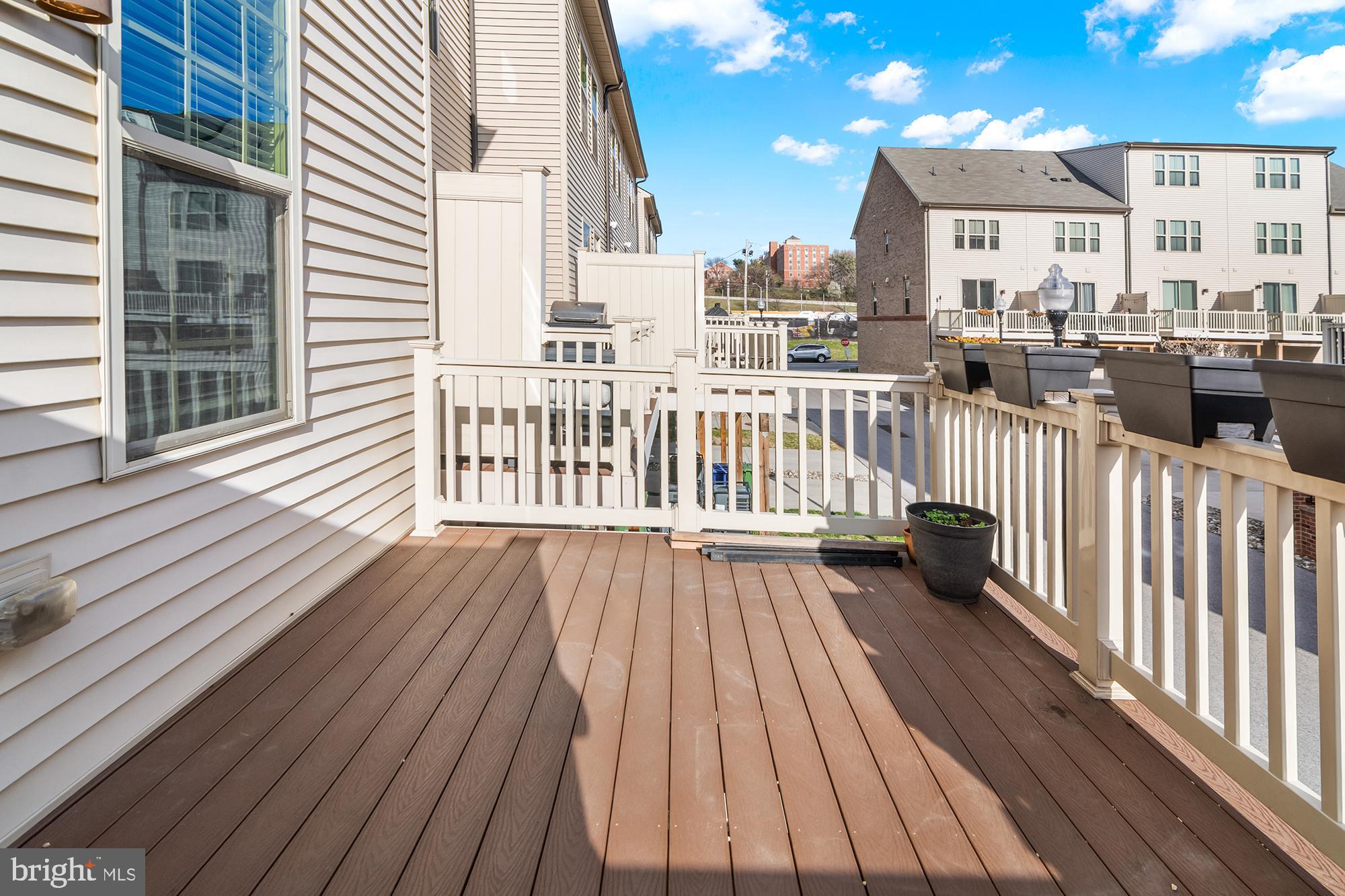 4701 Marlene Mews Baltimore, MD 21224 - Photo 35 of 39 a view of a balcony with wooden floor