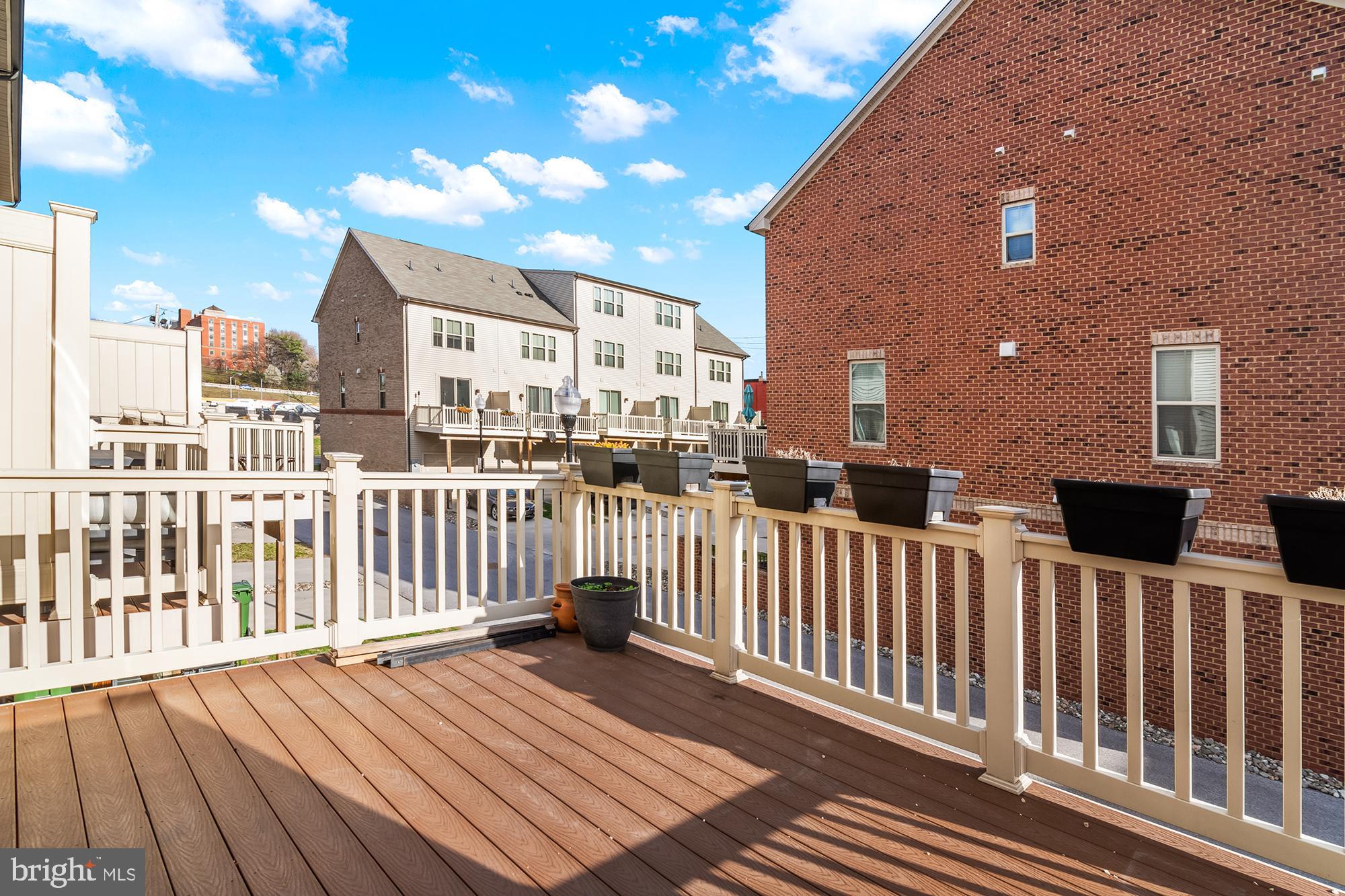 4701 Marlene Mews Baltimore, MD 21224 - Photo 36 of 39 a view of a house with wooden deck