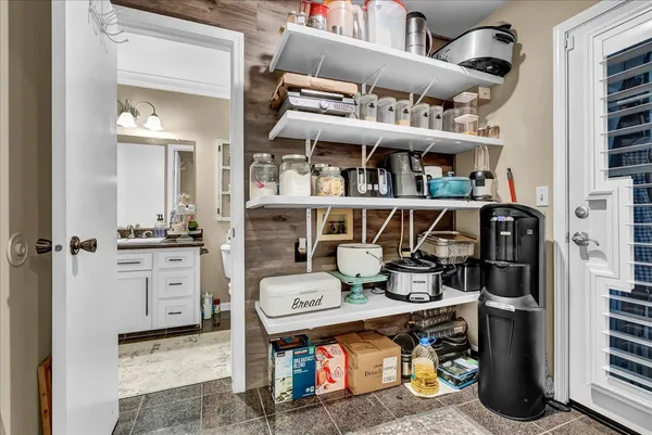a kitchen with stainless steel appliances granite countertop a stove and a sink