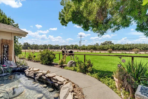 a view of a lake with a garden