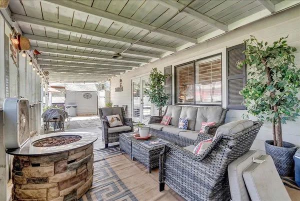 a outdoor space with lots of potted plants