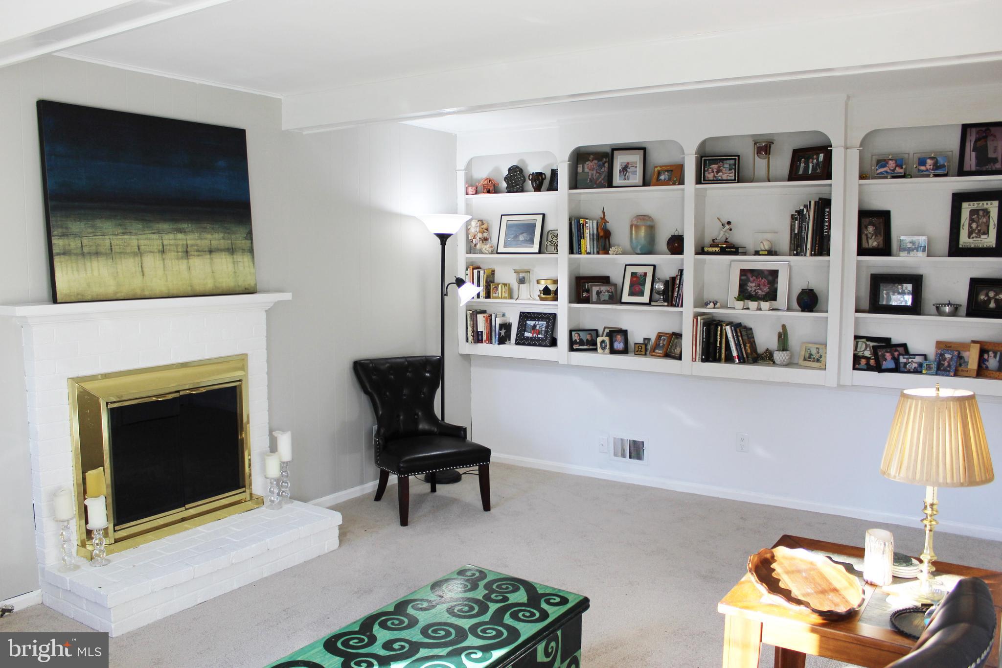 2 Thorburn Road Gaithersburg, MD 20878 - Photo 4 of 19 Fireplace and Built-In Bookshelves in Study