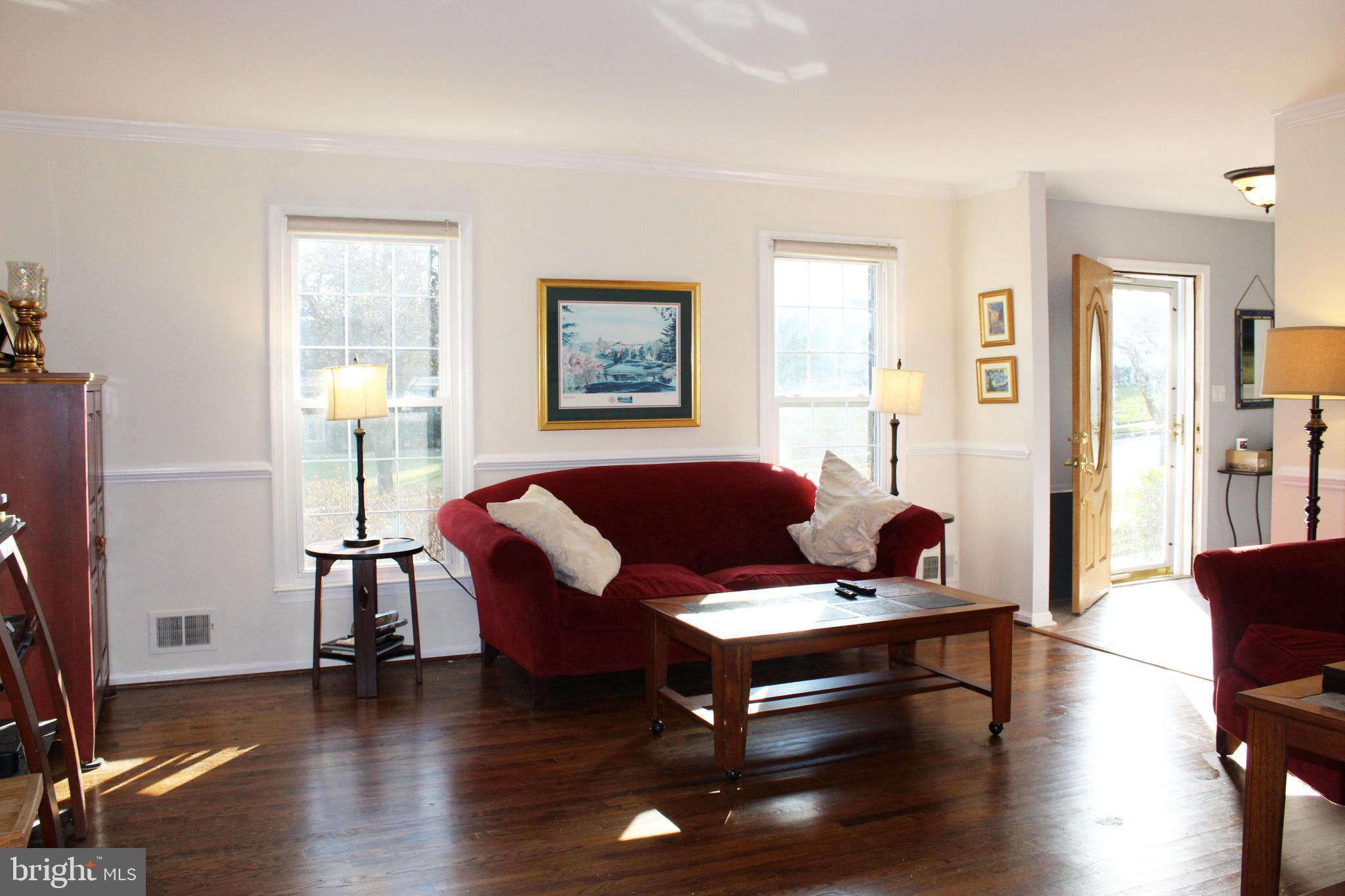 2 Thorburn Road Gaithersburg, MD 20878 - Photo 6 of 19 Living Room with Large Windows and Hardwoods