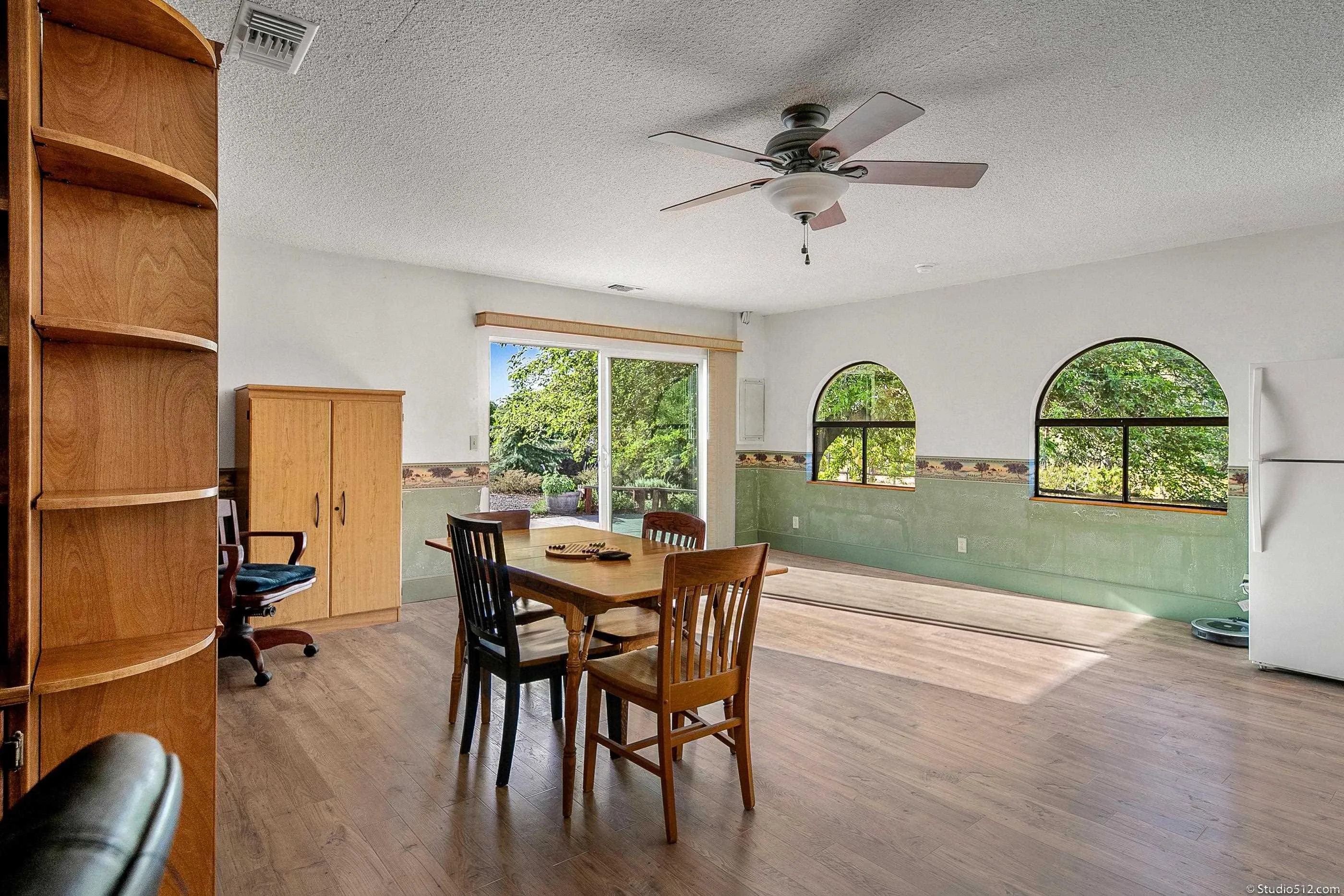 14847 Fruitvale Road Valley Center, CA 92082 - Photo 19 of 34 a view of a dining room with furniture window and wooden floor