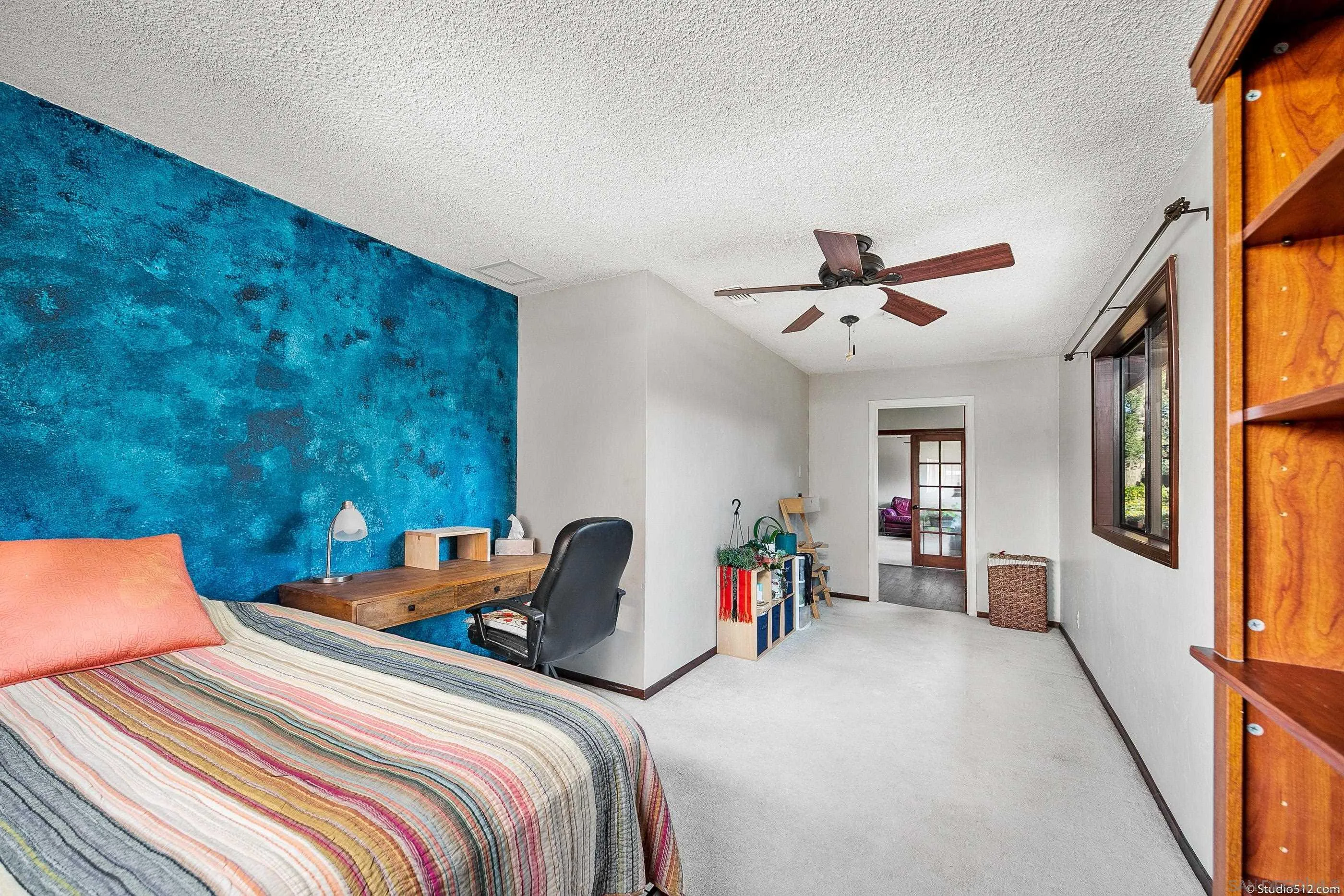 14847 Fruitvale Road Valley Center, CA 92082 - Photo 20 of 34 a bed room with a bed and a window