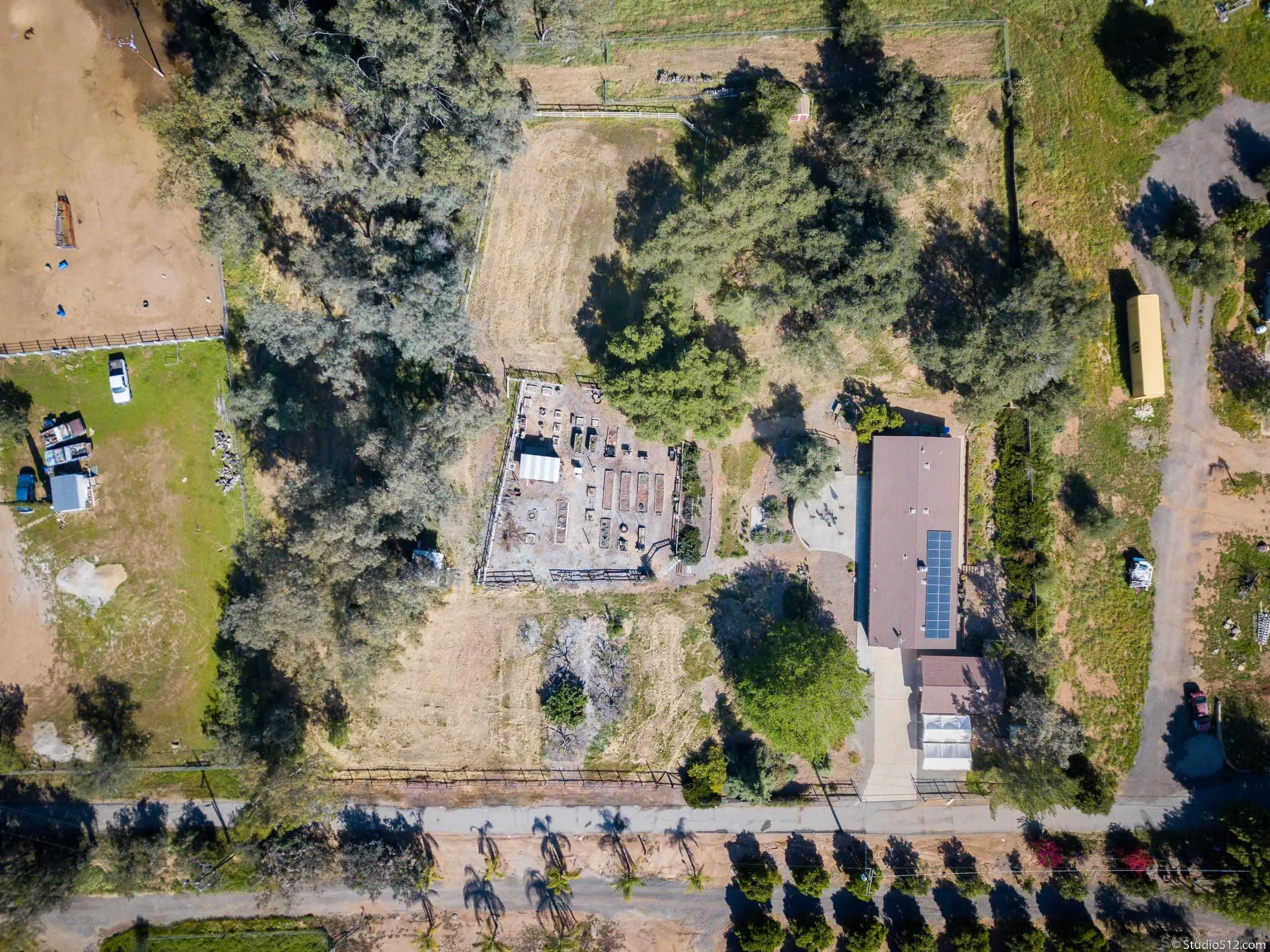 14847 Fruitvale Road Valley Center, CA 92082 - Photo 29 of 34 an aerial view of a house with a yard and large trees