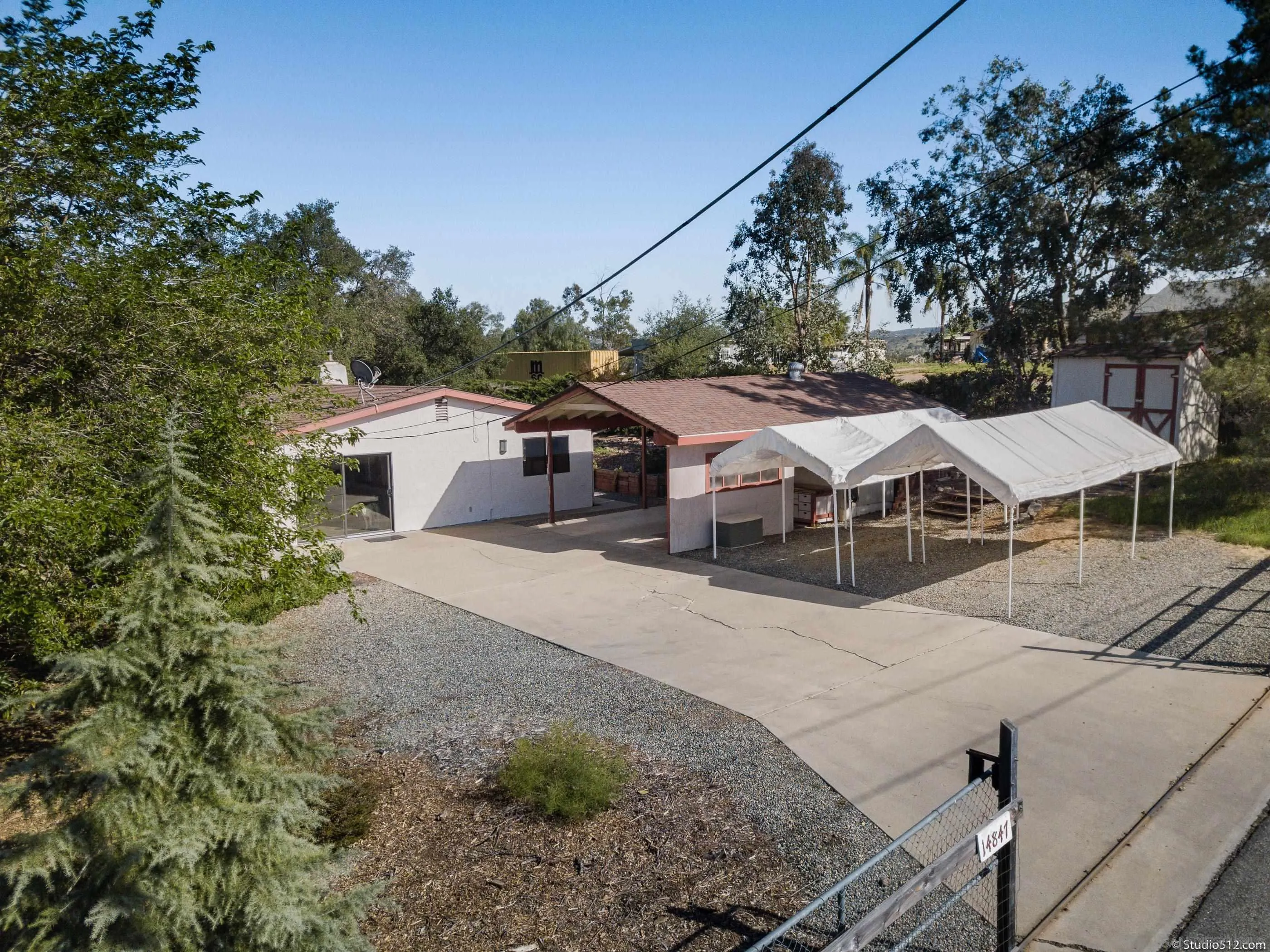 14847 Fruitvale Road Valley Center, CA 92082 - Photo 34 of 34 a view of a house with backyard and sitting area