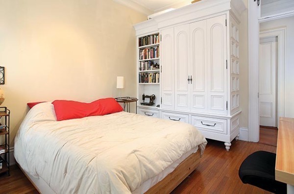 17 High Street, Unit 2 Brookline, MA 02445 - Photo 4 of 6 a bedroom with a bed and a window