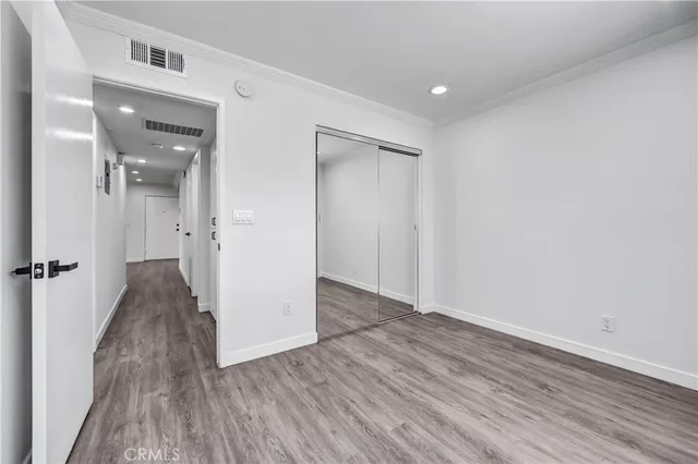 wooden floor in a hall with an entryway