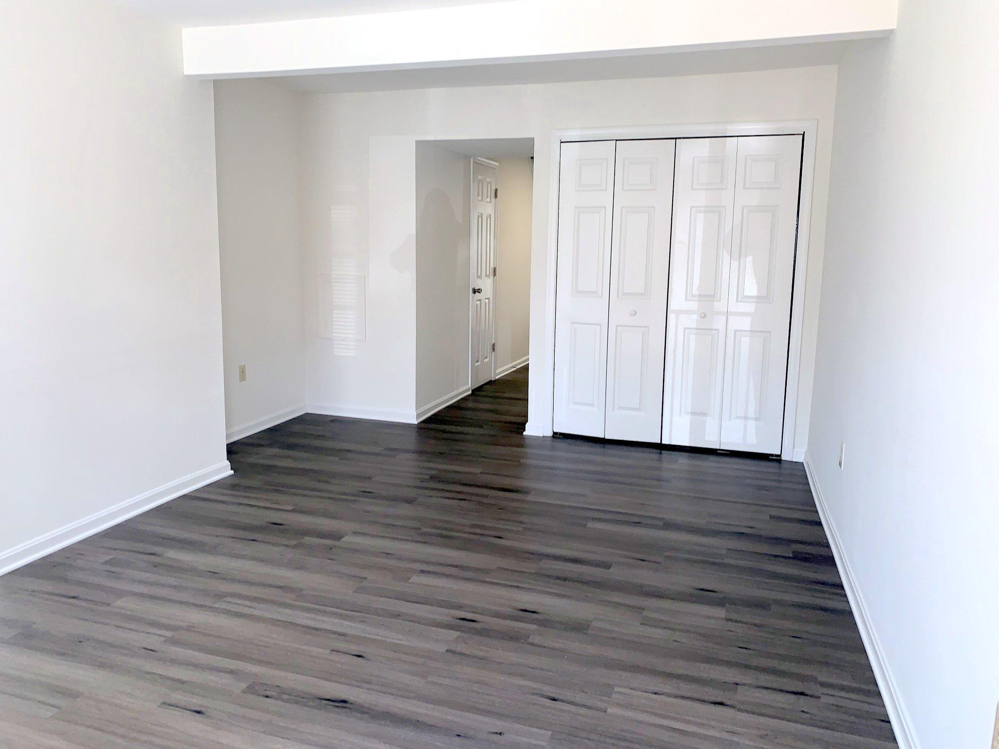 126 Ice Street Frederick, MD 21701 - Photo 5 of 13 Luxury vinyl plank flooring in the living room.