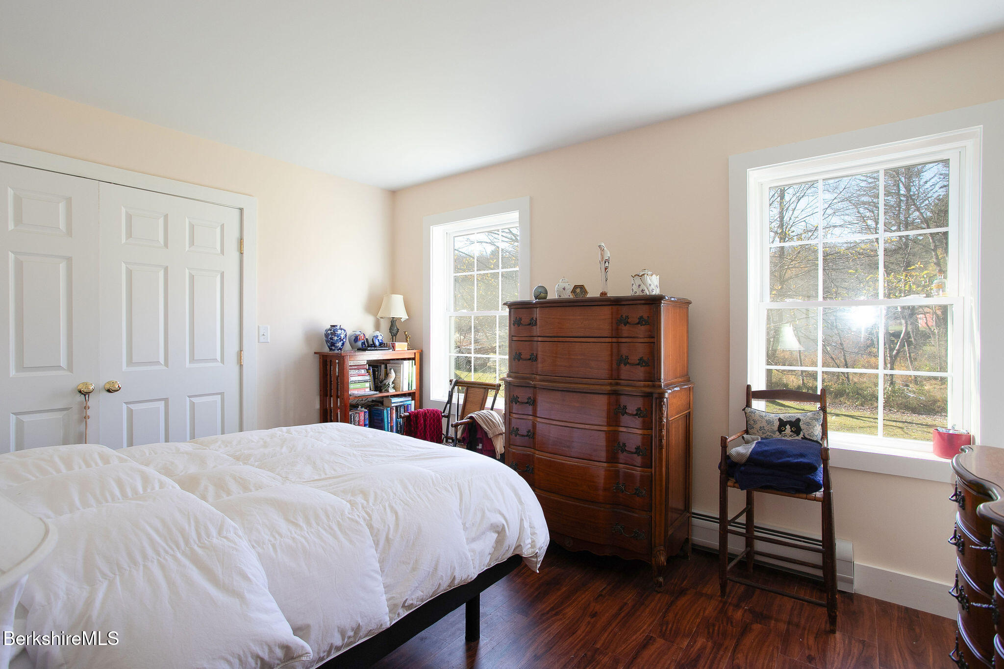128 Ymca Road Becket, MA 01223 - Photo 14 of 23 a bedroom with a bed and wooden floor