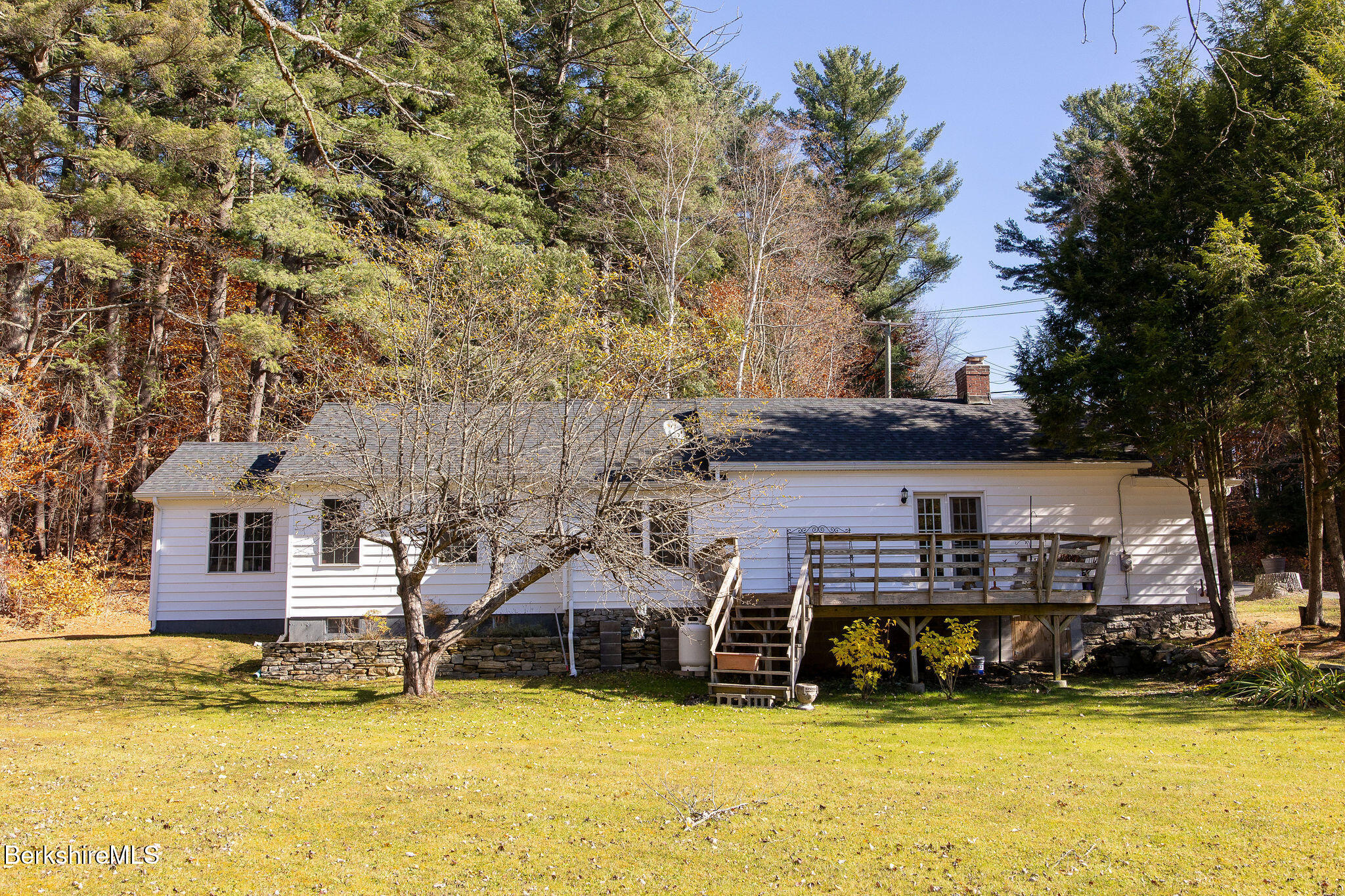 128 Ymca Road Becket, MA 01223 - Photo 3 of 23 a view of a house with swimming pool