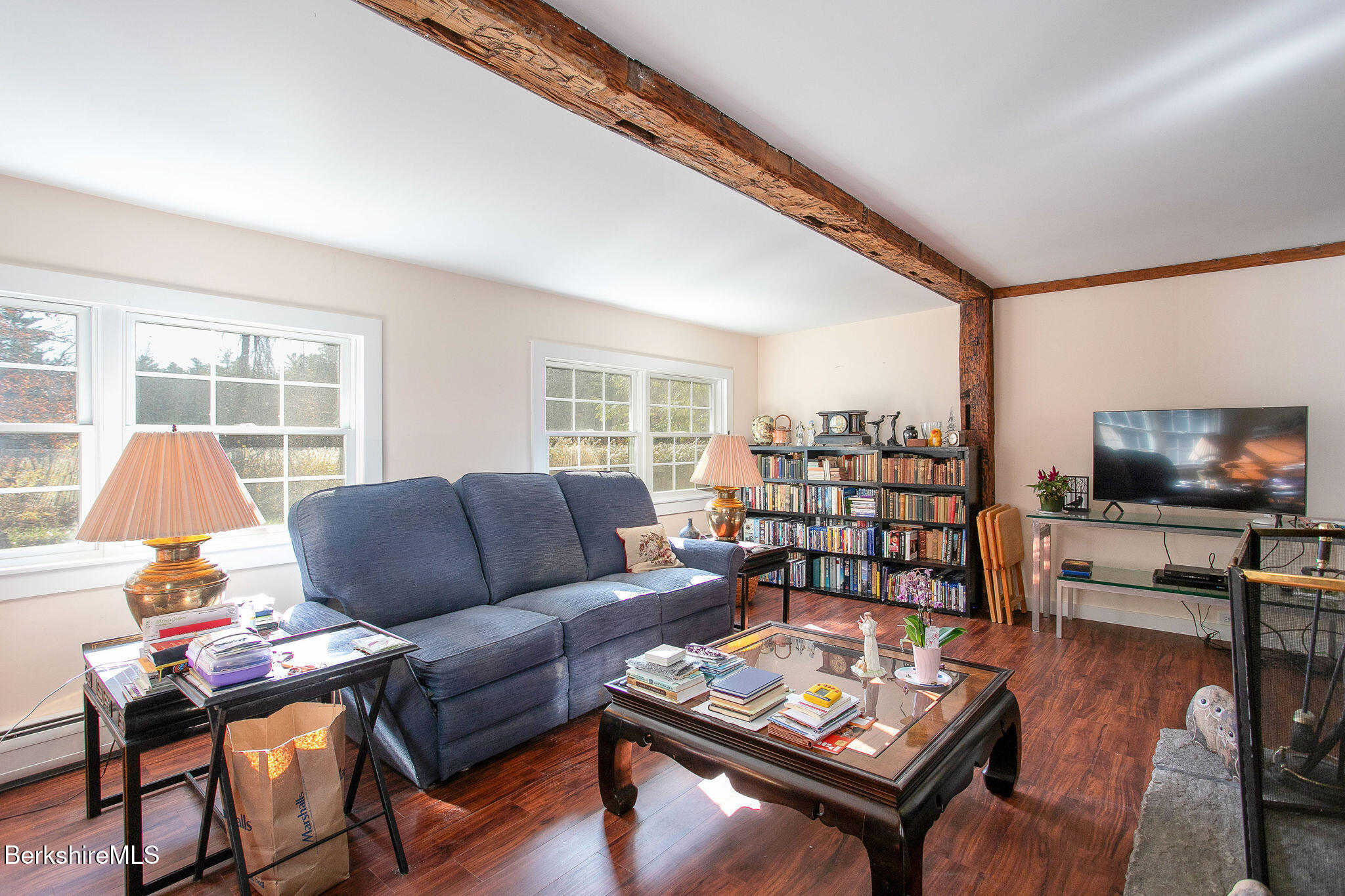128 Ymca Road Becket, MA 01223 - Photo 9 of 23 a living room with furniture and a flat screen tv