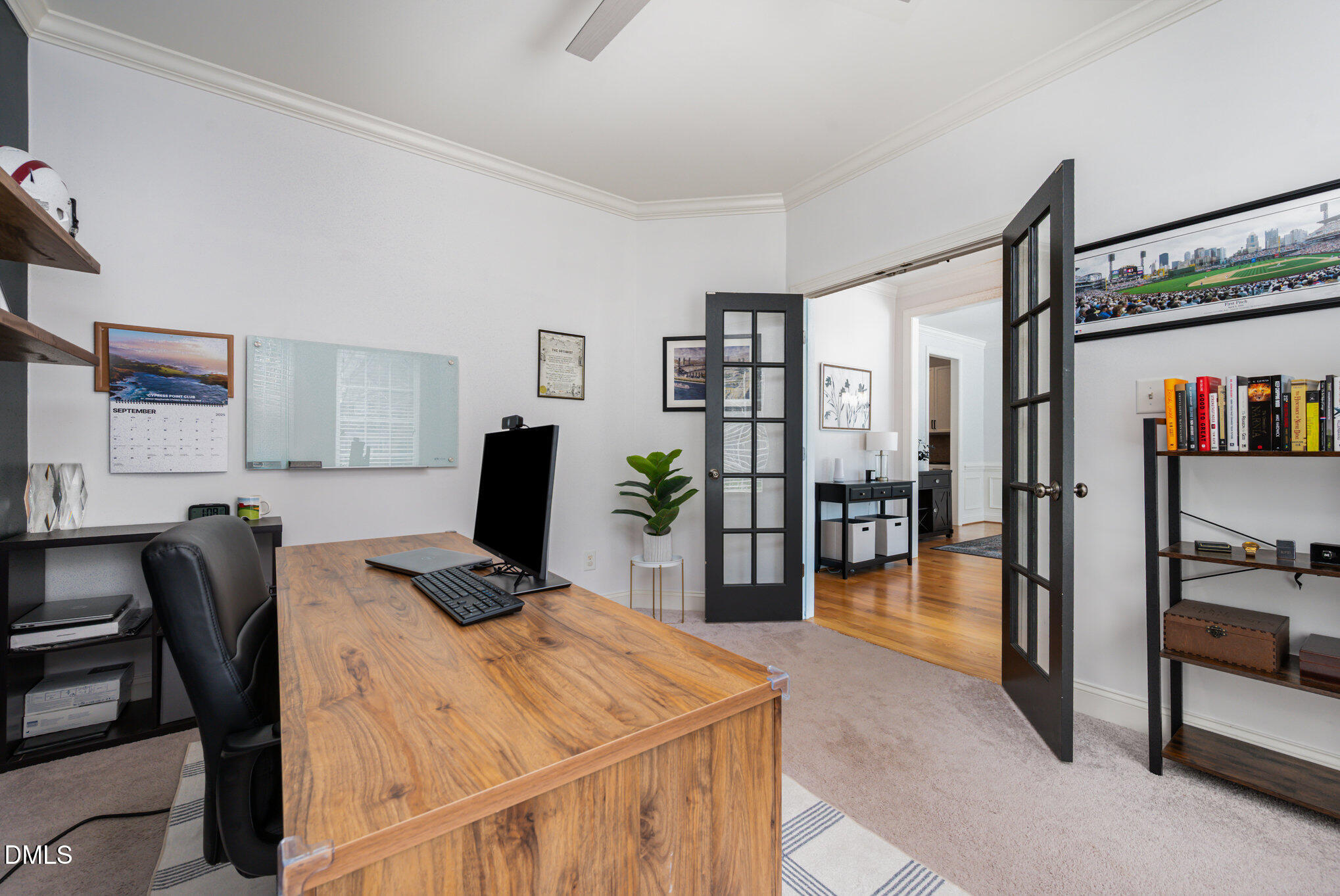 1613 Strategy Way Wake Forest, NC 27587 - Photo 15 of 40 a bedroom with furniture and a book shelf