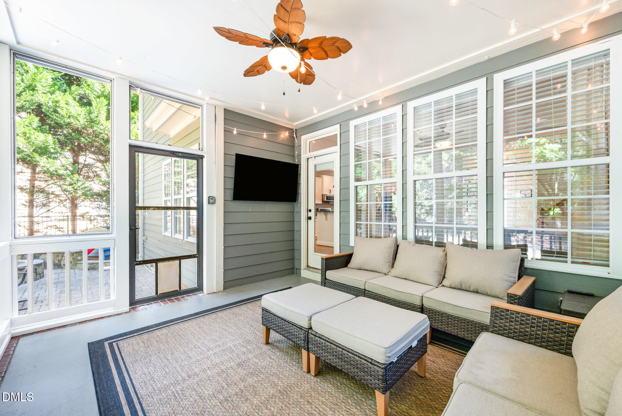 1613 Strategy Way Wake Forest, NC 27587 - Photo 24 of 40 a living room with furniture tv and a large window