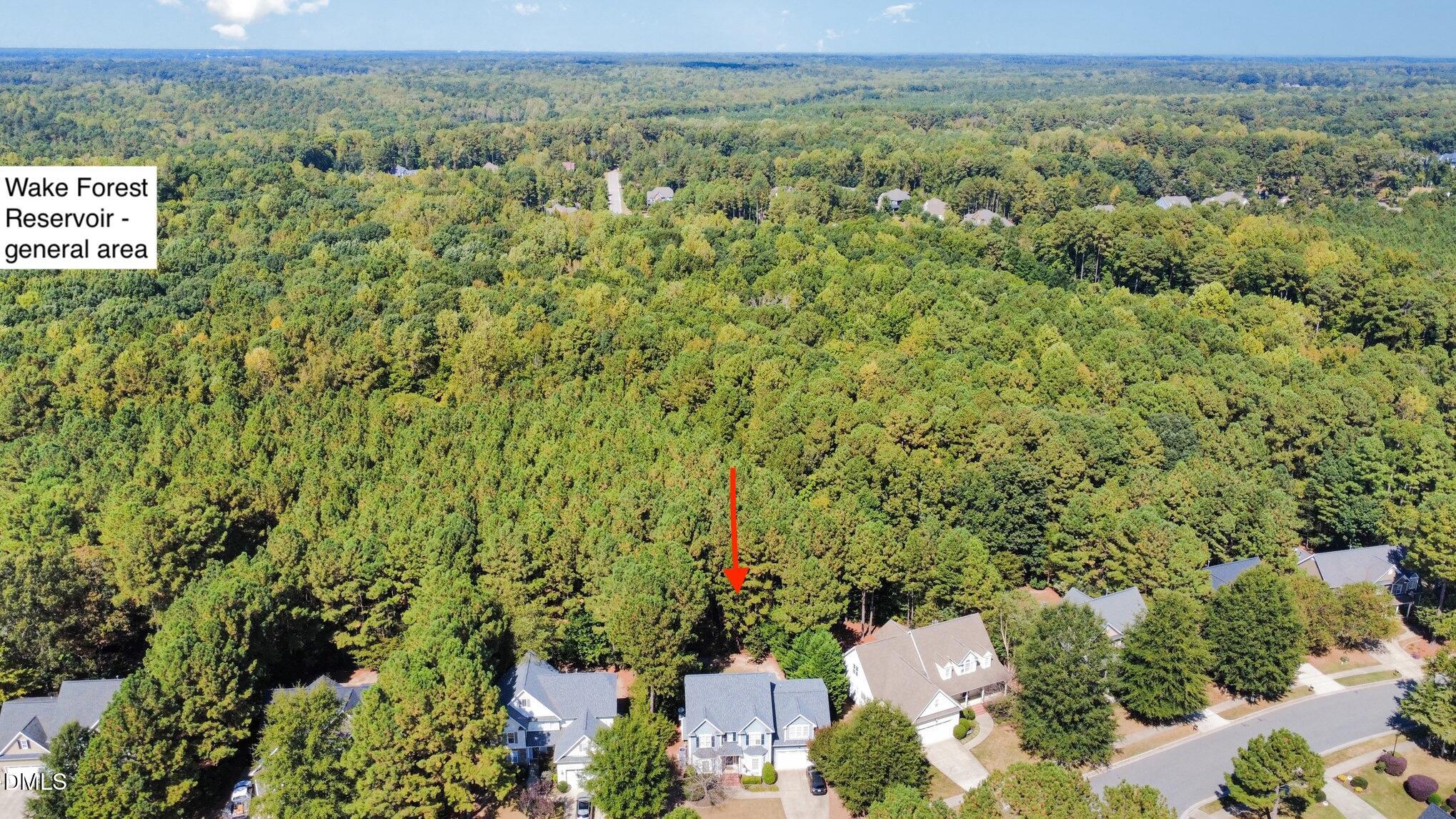 1613 Strategy Way Wake Forest, NC 27587 - Photo 2 of 40 an aerial view of a house with a yard