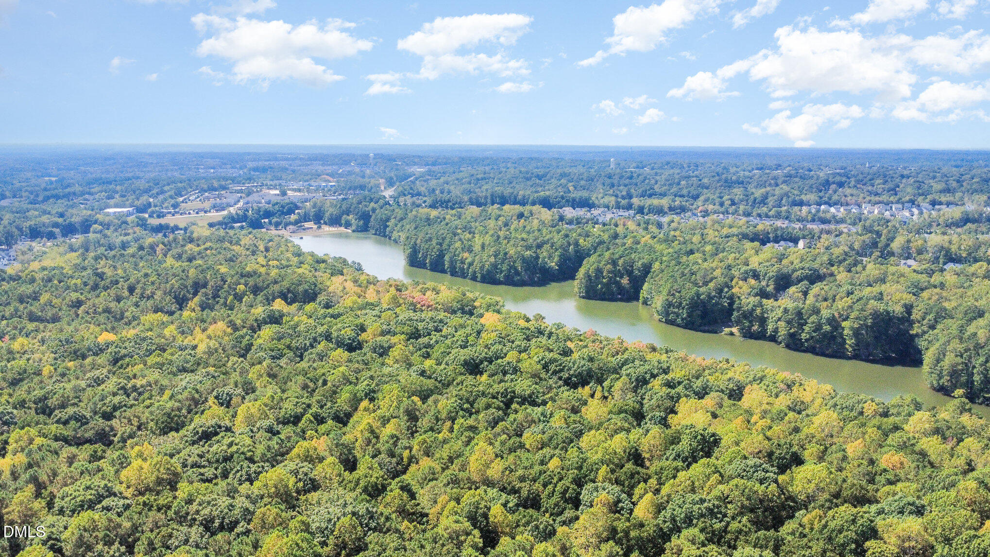 1613 Strategy Way Wake Forest, NC 27587 - Photo 30 of 40 an aerial view of residential house with green space and fog