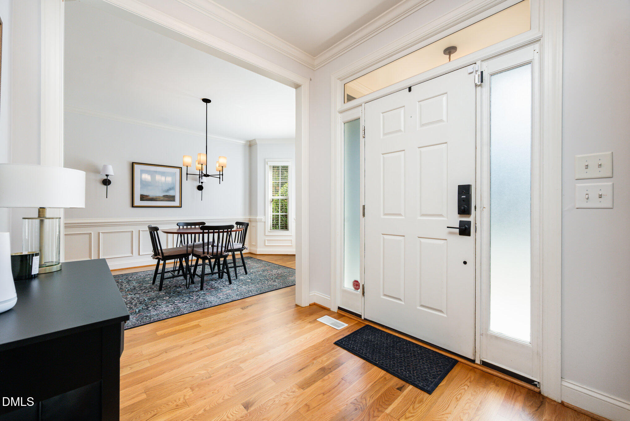 1613 Strategy Way Wake Forest, NC 27587 - Photo 4 of 40 a view of a room with furniture and wooden floor
