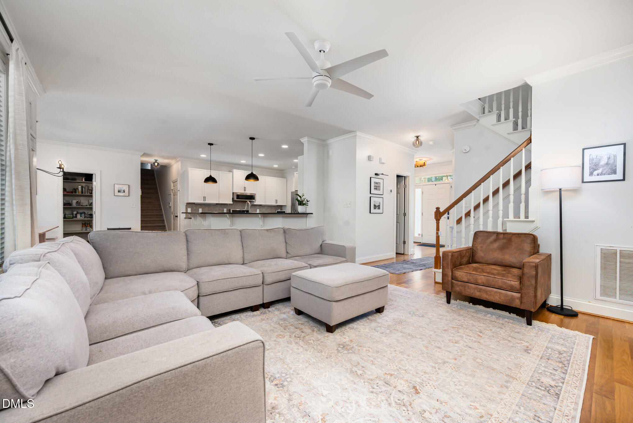 1613 Strategy Way Wake Forest, NC 27587 - Photo 6 of 40 a living room with furniture and white walls