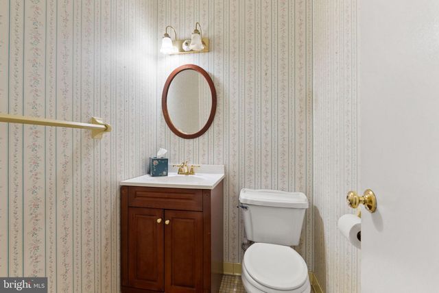 a kitchen with cabinets appliances and a counter space