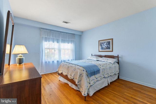 a room with walk in closet and a window