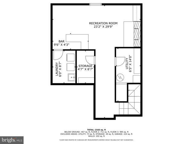 a picture of a bench in front of a wall