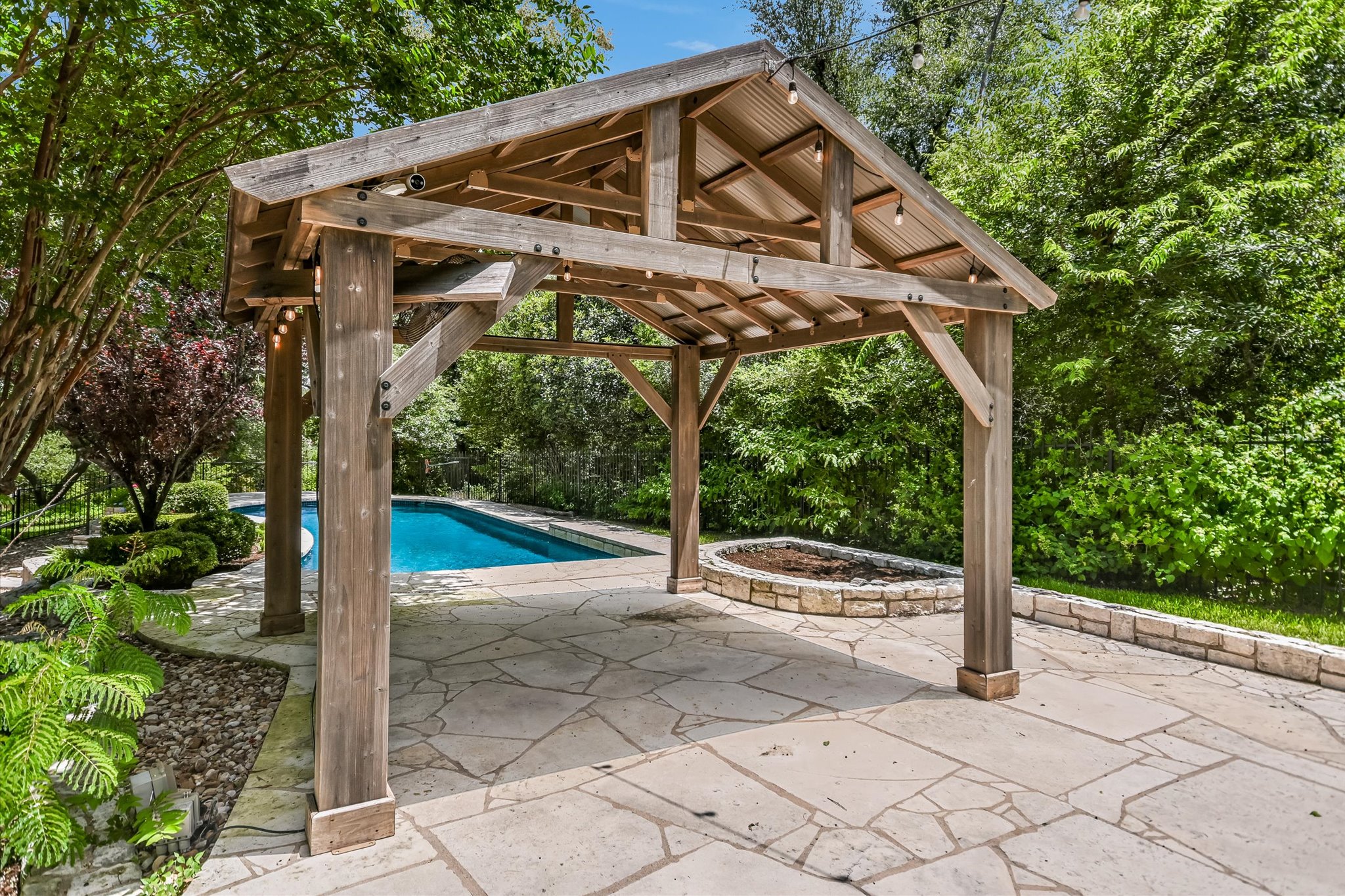 18 Ehrlich Road Austin, TX 78746 - Photo 3 of 36 12X14 Pergola provides shade for relaxing by the pool