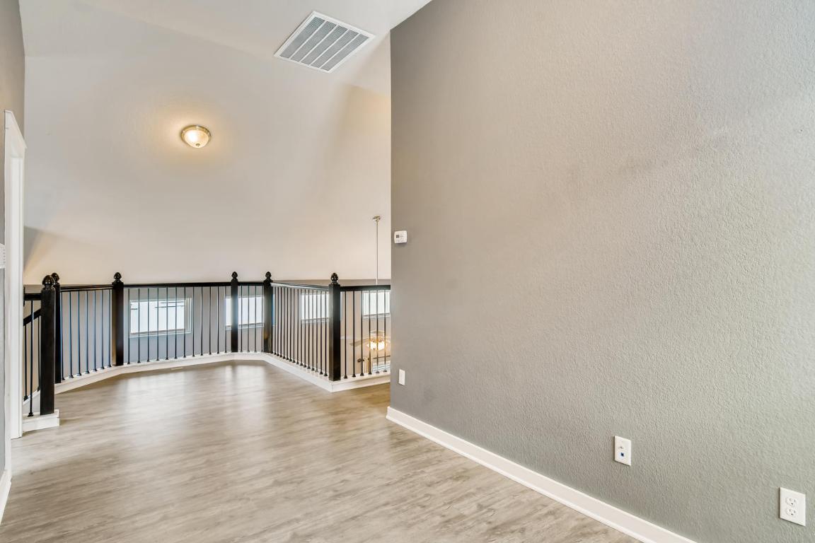 16229 Travesia Way Austin, TX 78728 - Photo 24 of 28 a view of entryway with wooden floor