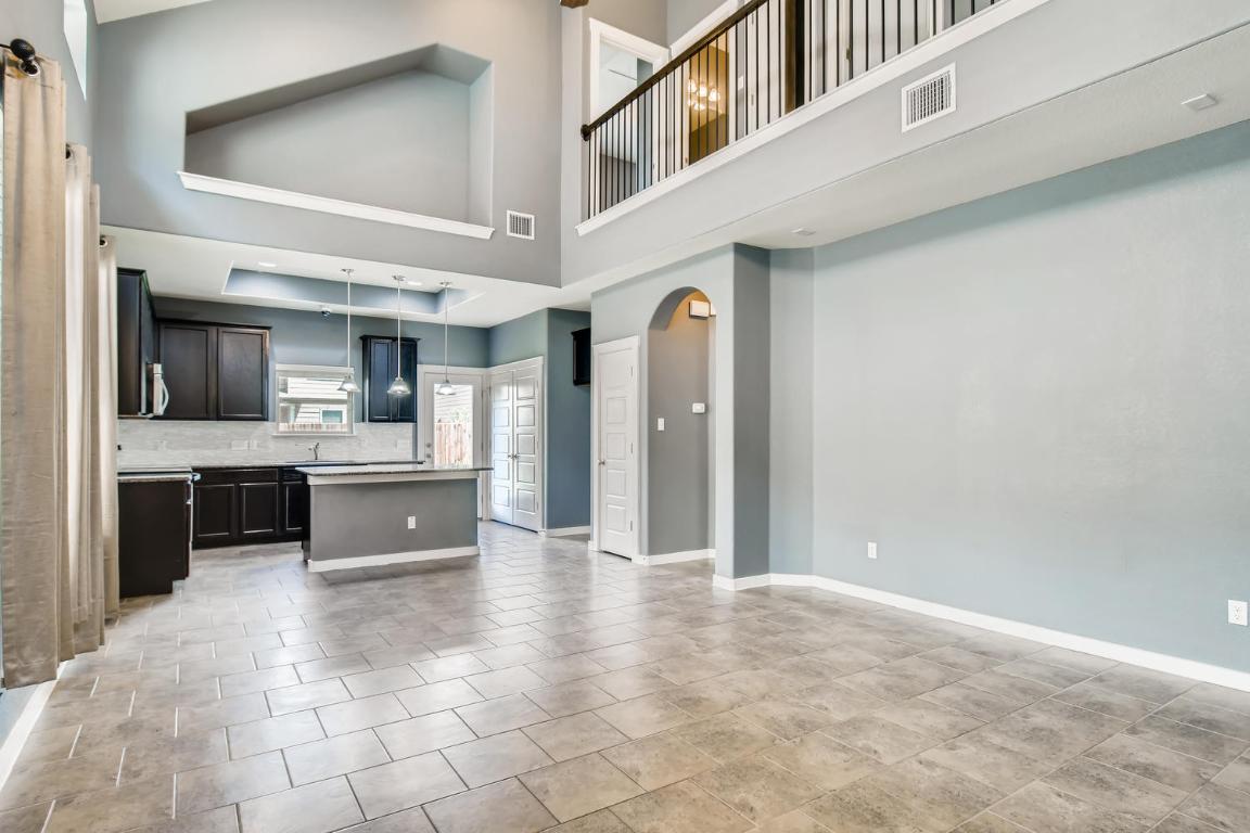 16229 Travesia Way Austin, TX 78728 - Photo 4 of 28 a view of a kitchen cabinets a sink and a counter top space